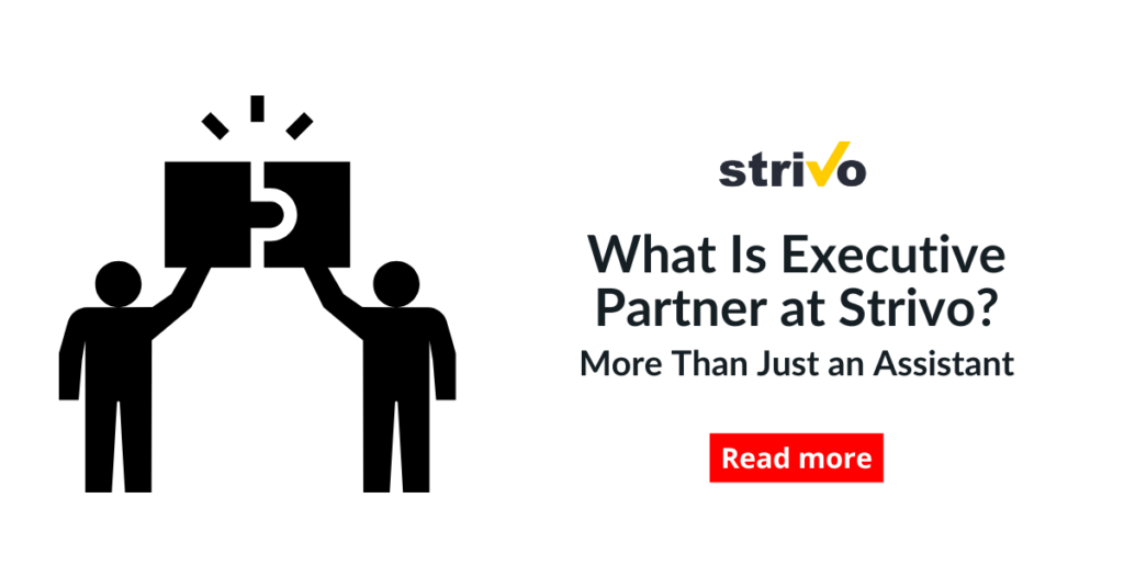 Two people connect large puzzle pieces together, symbolizing teamwork and support, representing what is executive partner.